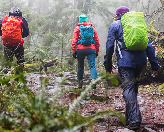 People hiking with Rainydays clothing